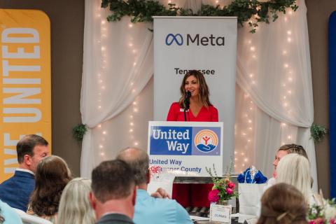 ceo_erin_birch_addresses_crowd_of_250_attendees_at_2023_community_impact_breakfast.